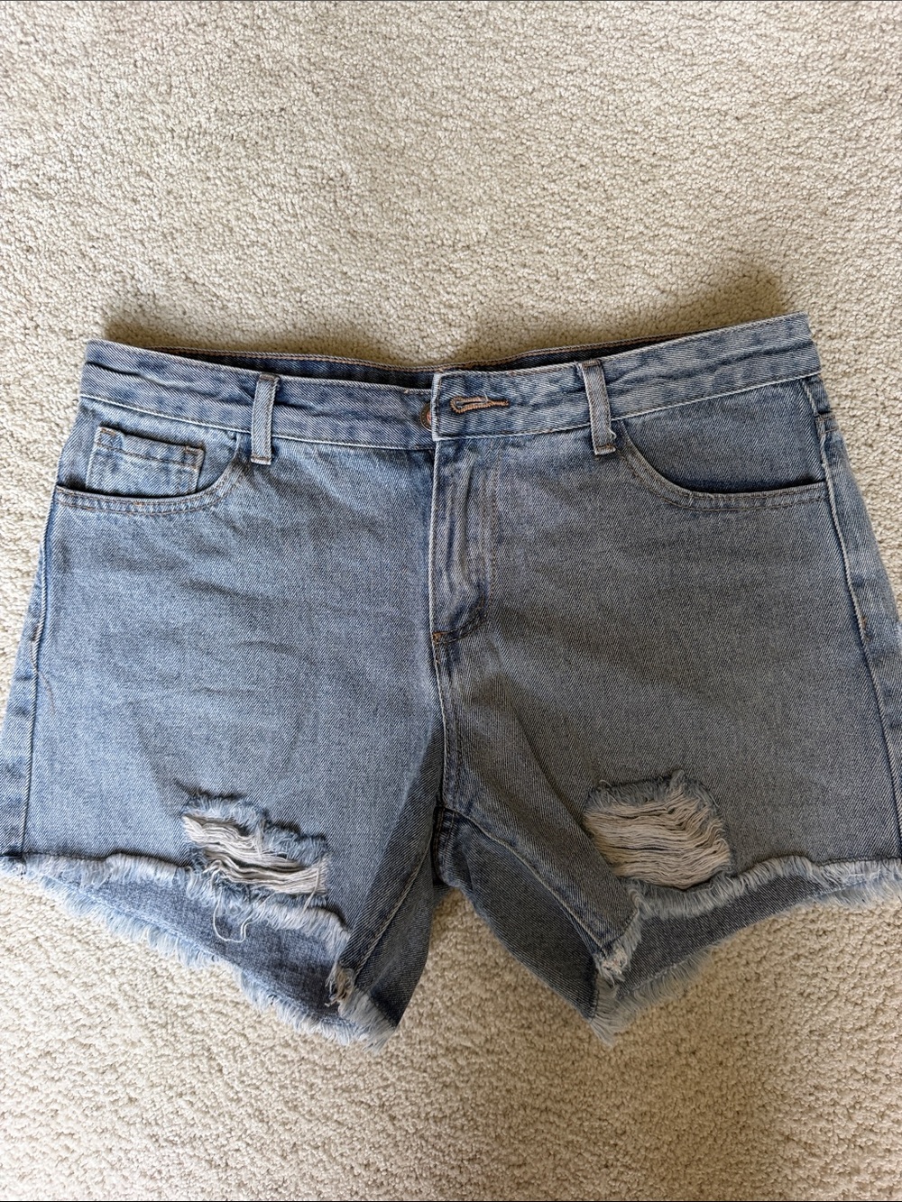 High-Rise Light Blue Distressed Denim Shorts